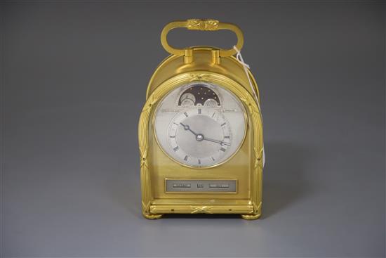 Philip Thornton for Frodsham. A gilt brass cased humpback eight day carriage timepiece, height 8in. handle down 6.75in. width 5in. dept